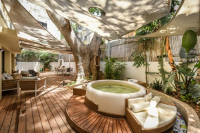 Charming 2BR Apt with a Breathtaking Patio in the Heart of the City with Shelter by Sea N' Rent